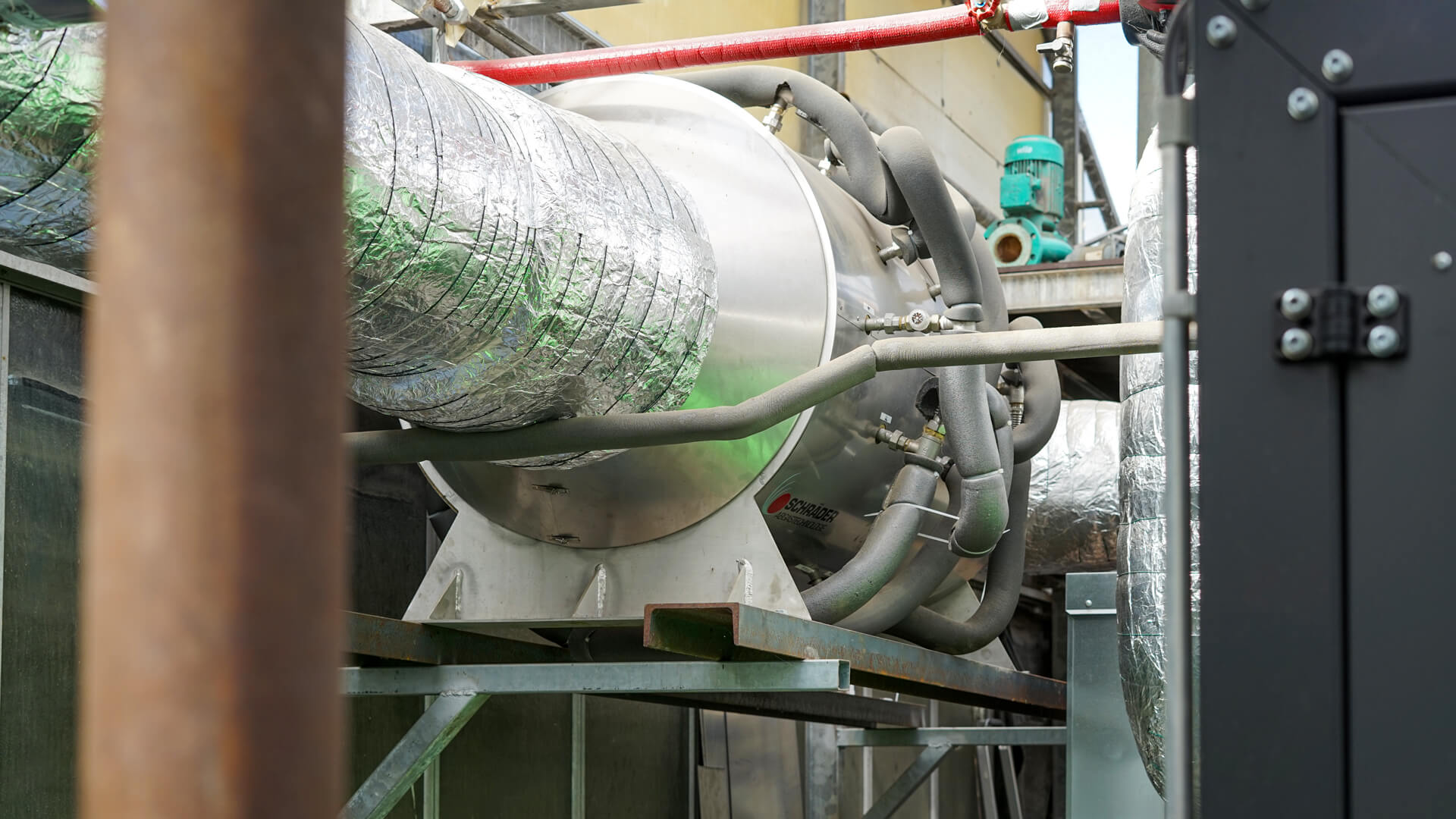 prozesswaerme-abgaswaermetauscher-biomasseheizung Abgaswärmetauscher in einem Gewächshaus