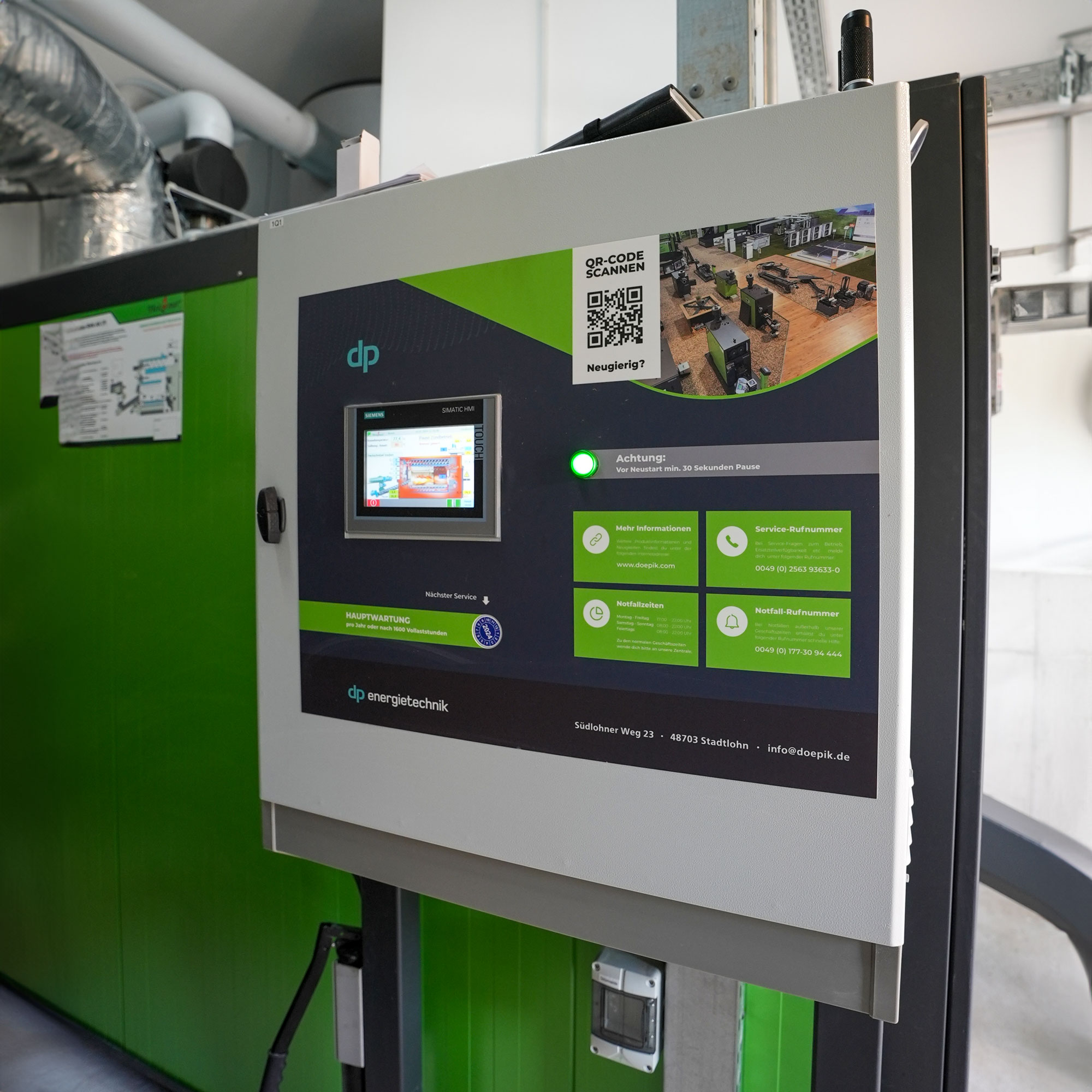 schaltschrank-steuerung-siemens Grüner Schaltschrank zur Steuerung der Biomasseheizung von Heizomat