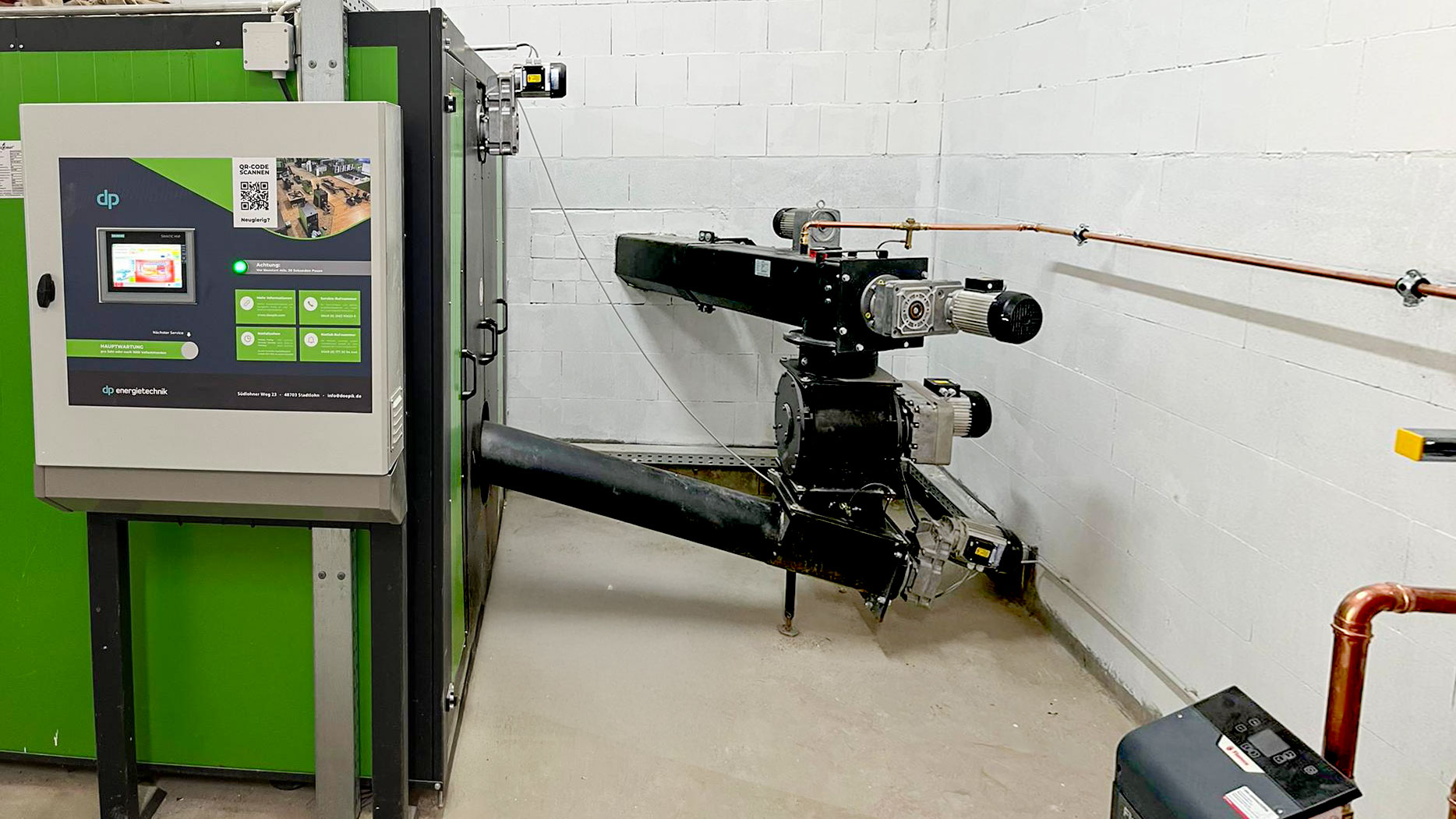 biomasseheizung-nahwaerme-heizomat Zellenradschleuse und Biomasseheizung von Heizomat