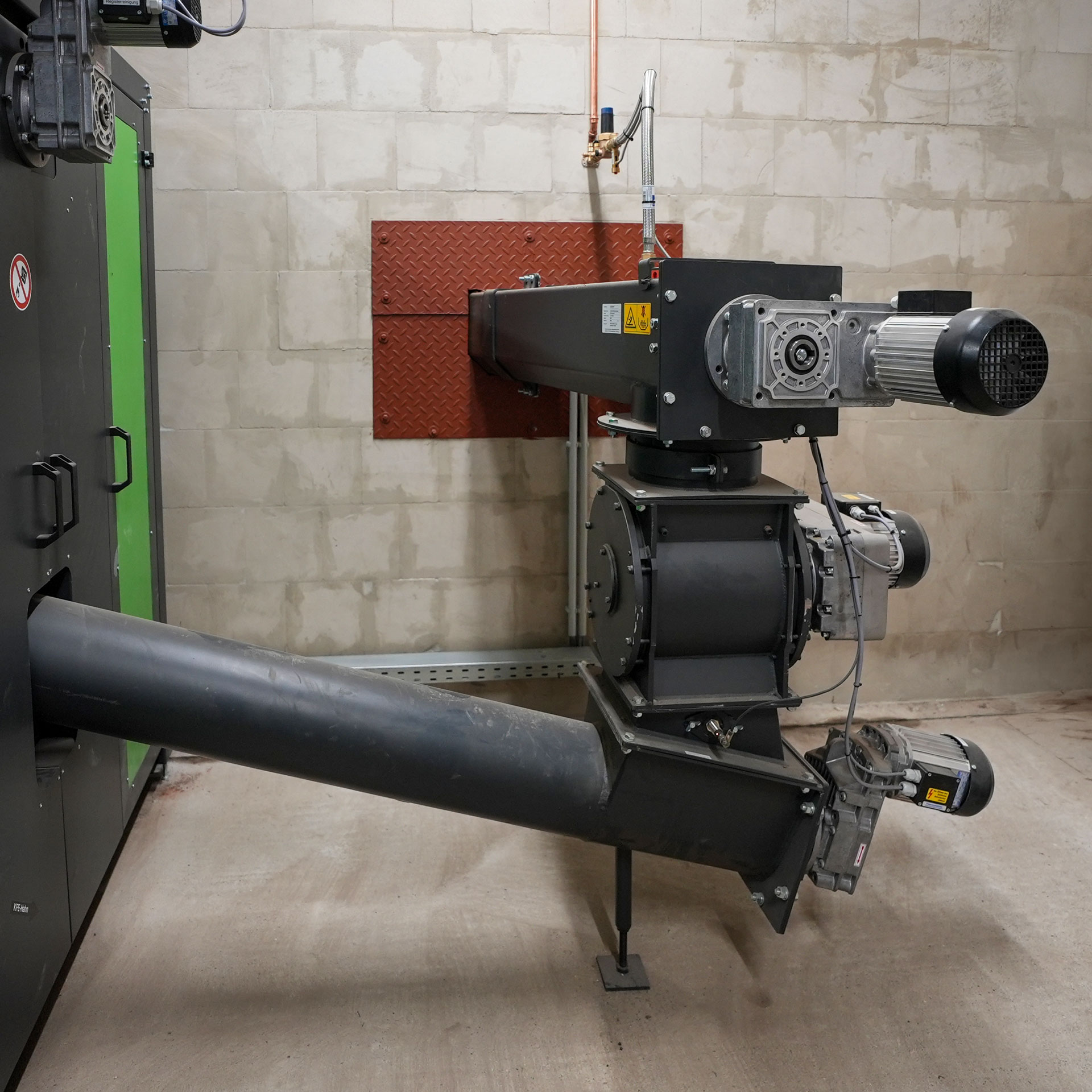 zellenradschleuse-heizomat-hackschnitzel Zellenradschleuse und Fördertechnik einer Heizomat Hackschnitzelheizung