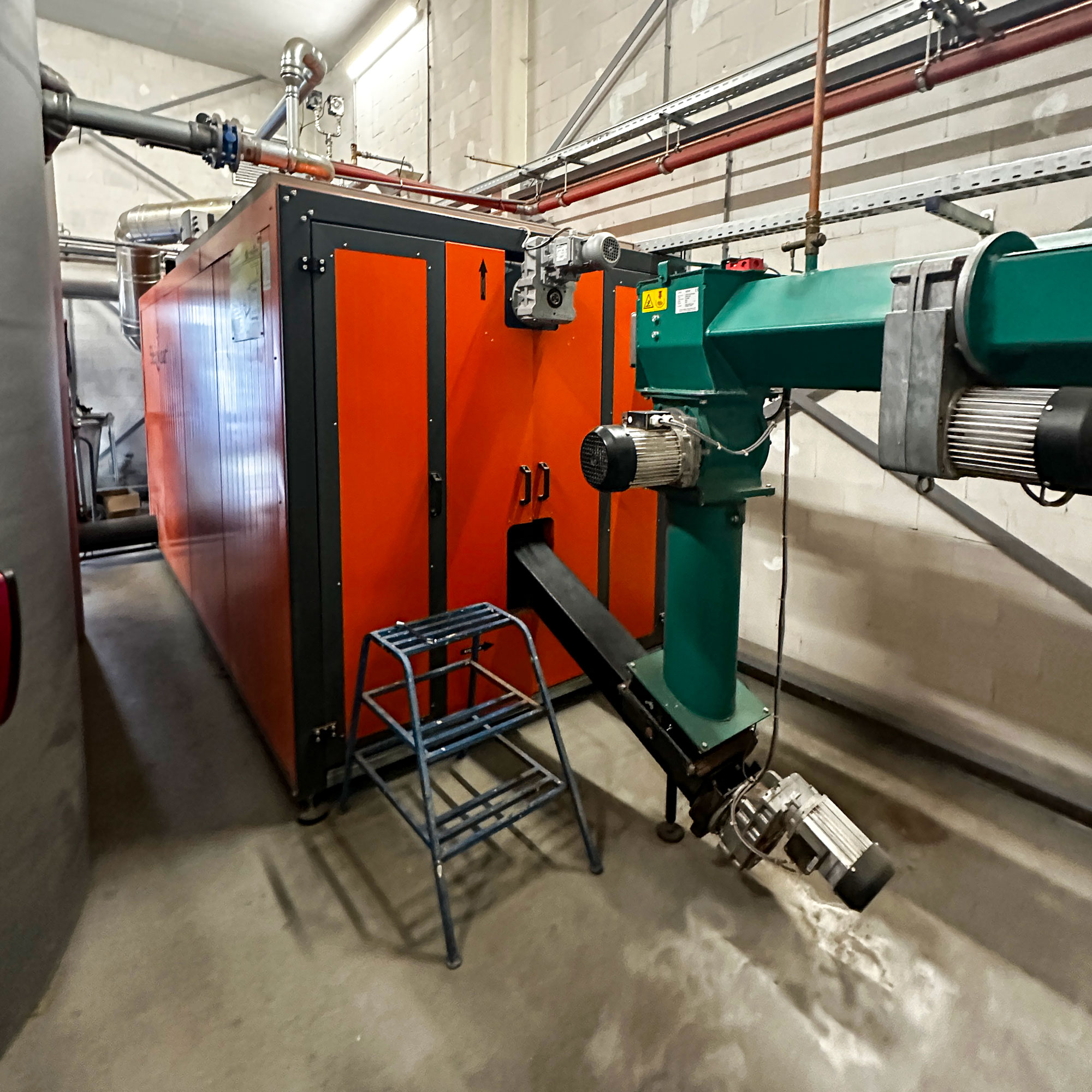 heizomat-biomasseheizung-tischlerei Heizzentrale mit einer 500 kW Holzheizung von Heizomat