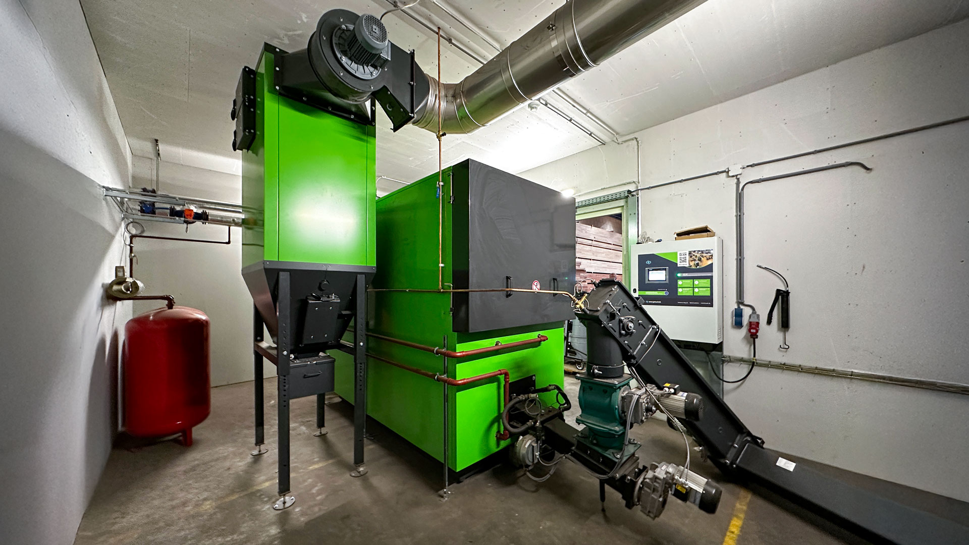 Holzheizung in einer Tischlerei mit Multizyklon